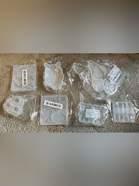 Large lot of silicone molds for resin etc. most new. Aprox 56 in this group